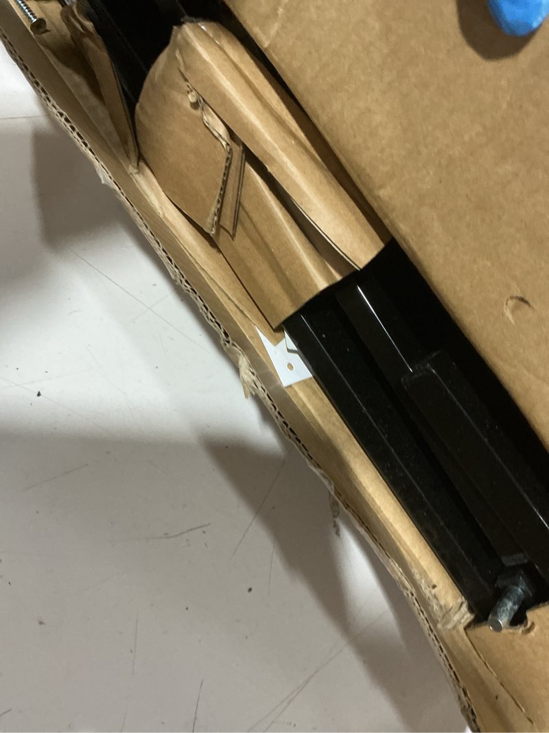 Condition photo showing As Is for regalo safety 29-49" easy step extra wide baby gate for doorways & bottom of stairs, pressure mounted safety gate with door for babies, toddlers & pets, black black 29-49"w x 30"h
