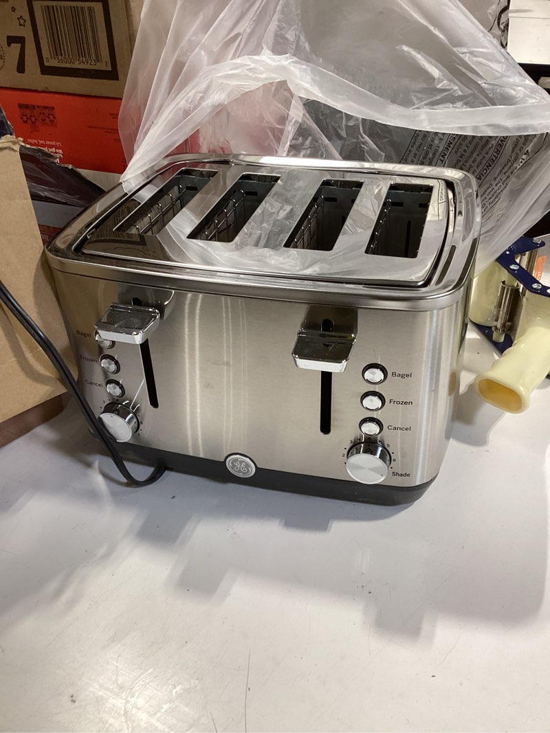 Condition photo showing Good Condition for GE 4 Slice Toaster | Extra Wide Slots for Bagels, Breads, Waffles & More | 7 Shade Options | Countertop Kitchen Essentials | 1500 watt, White 4-Slice White