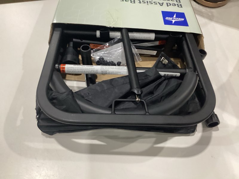 Condition photo showing As Is for medline bed assist bar with storage pocket, height adjustable bed rail for elderly adults, assistance for getting in and out of bed at home