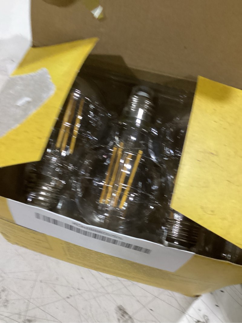 Condition photo showing As Is for ascher 60 watt equivalent, e26 led filament light bulbs, warm white 2700k, non-dimmable, classic clear glass, a19 led light bulb with 80 cri, pack of 6 warm white 2700k 6 count (pack of 1)