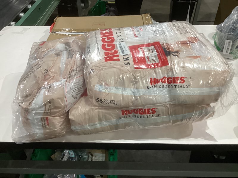 Condition photo showing As Is for Huggies Size 3 Diapers, Skin Essentials Baby Diapers, Size 3 (16-28 lbs), 168 Count (3 Packs of 56), Packaging May Vary Size 3 168