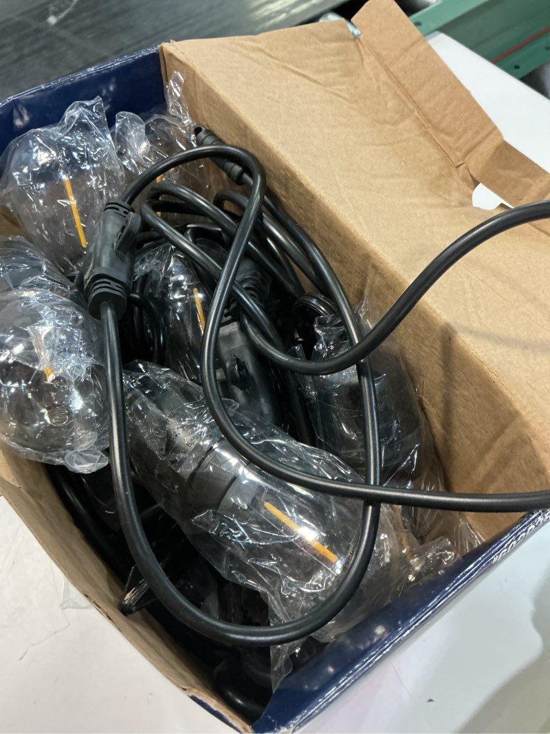 Condition photo showing As Is for harbor breeze 27-ft solar black indoor/outdoor string light with 10 white -light led edison bulbs