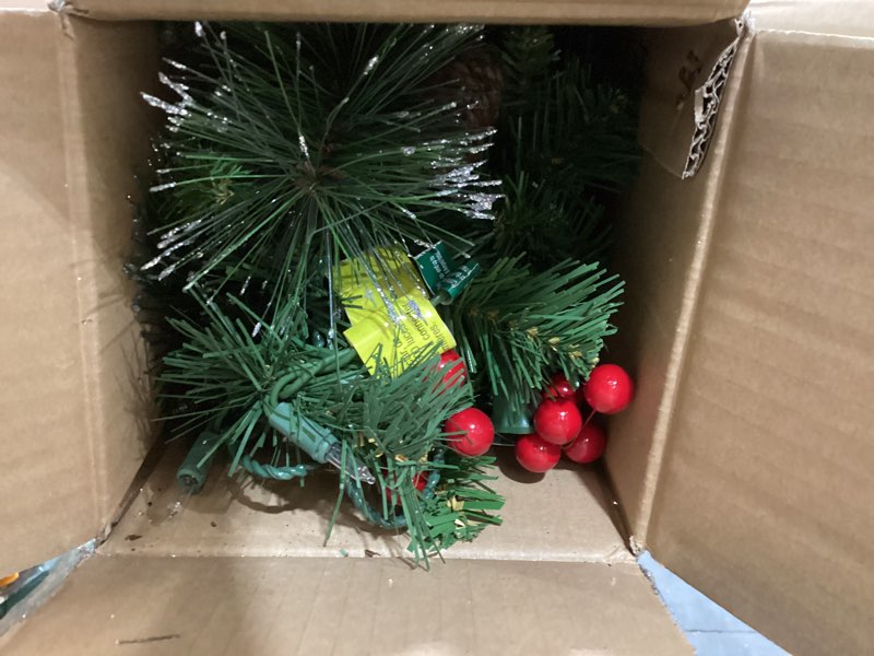 Condition photo showing Good Condition for national tree company 9 ft pre-lit crestwood spruce artificial christmas garland, christmas decoration with glitter, pinecones, red berries, 50 clear lights, 180 tips, green plug in tree
