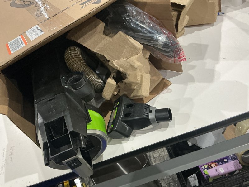 Condition photo showing As Is for bissell cleanview swivel pet upright bagless vacuum, automatic cord rewind, powerful pet hair pickup, specialized tools, large dirt tank, teal