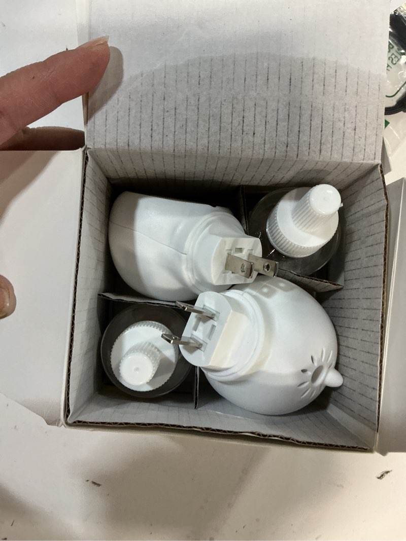 Condition photo showing Good Condition for Dog Calming Diffuser, 4 in 1 Puppy Pheromones Calming Diffuser, Relaxing Pheromone for Dogs Relief Stress Anxiety Reduce Aggression Barking, Help Train Dog to Pee, 2 Diffuser 2 Refill(48ml) 2 Diffuser 2 Refills