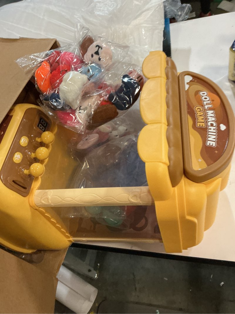 Condition photo showing Good Condition for MIAOKE Large Claw Machine for Kids, Musical Electronic Arcade Game Console with Adjustable Sound, Christmas and Birthday Gift for Kids, Includes 30 Toys & 24 Game Coins & 20 Surprise Eggs Khaki