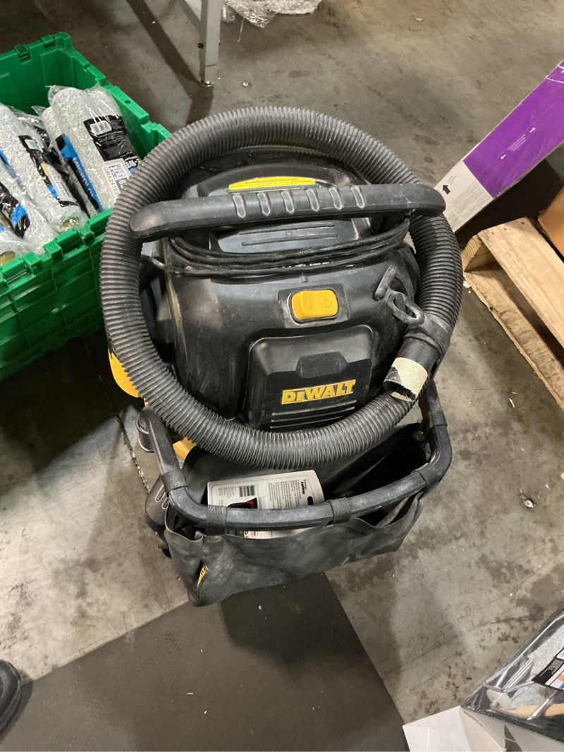 Condition photo showing As Is for DEWALT 9-Gallon 5 HP Corded Wet/Dry Shop Vacuum with Accessories Included