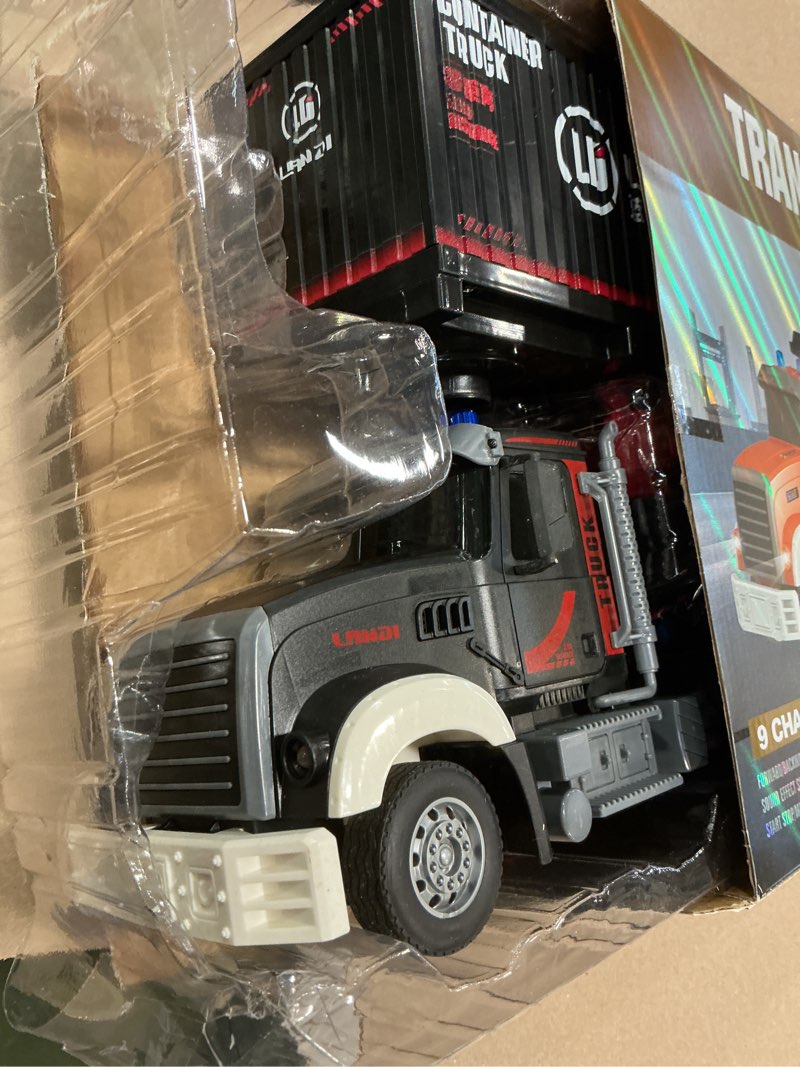 Condition photo showing As Is for RC Semi Truck, Remote Control Semi Truck and Trailer Toy 22.5 Inch, 2.4Ghz Semi Truck Toy with Sound and Lights Road Roller Model, 1/24 RC Construction Vehicles Toy for Adults & Kids Boys Road Roller Semi Truck