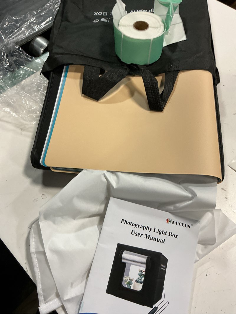 Condition photo showing Good Condition for light box photography, 12"x12" photo booth box with 120 led lights dimmable & cri?95, portable lightbox with 8 backdrops for mini product photography: jewelry, cards, watches
