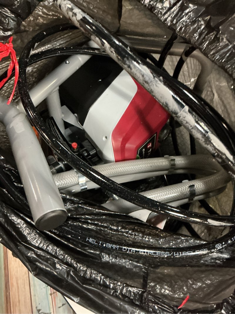 Condition photo showing As Is for titan controlmax 1700 electric stationary airless paint sprayer