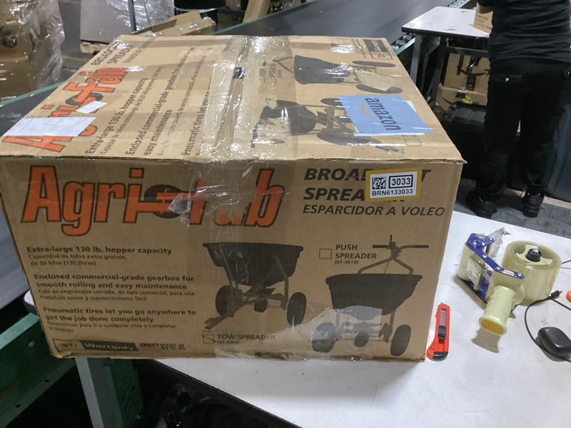 Condition photo showing Good Condition for agri-fab 45-0463 pull behind broadcast spreader,130 lb. hopper capacity designed for seed, fertilizer, salt, ice melt with universal hitch,12 ft. spread width for riding lawn mowers and lawn tractors