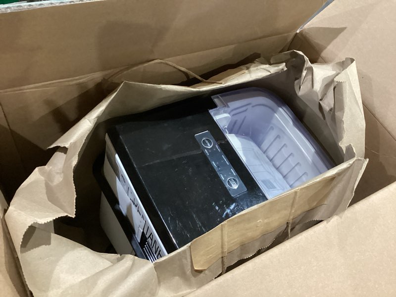 Condition photo showing As Is for newbulig ice makers countertop with handle, portable ice machine, 9 bullet cubes in 6 mins, 26lbs in 24hrs, auto-cleaning, with basket and scoop, for home, kitchen, rv, camping, black black handle 12.5"*11.6"*8.8"
