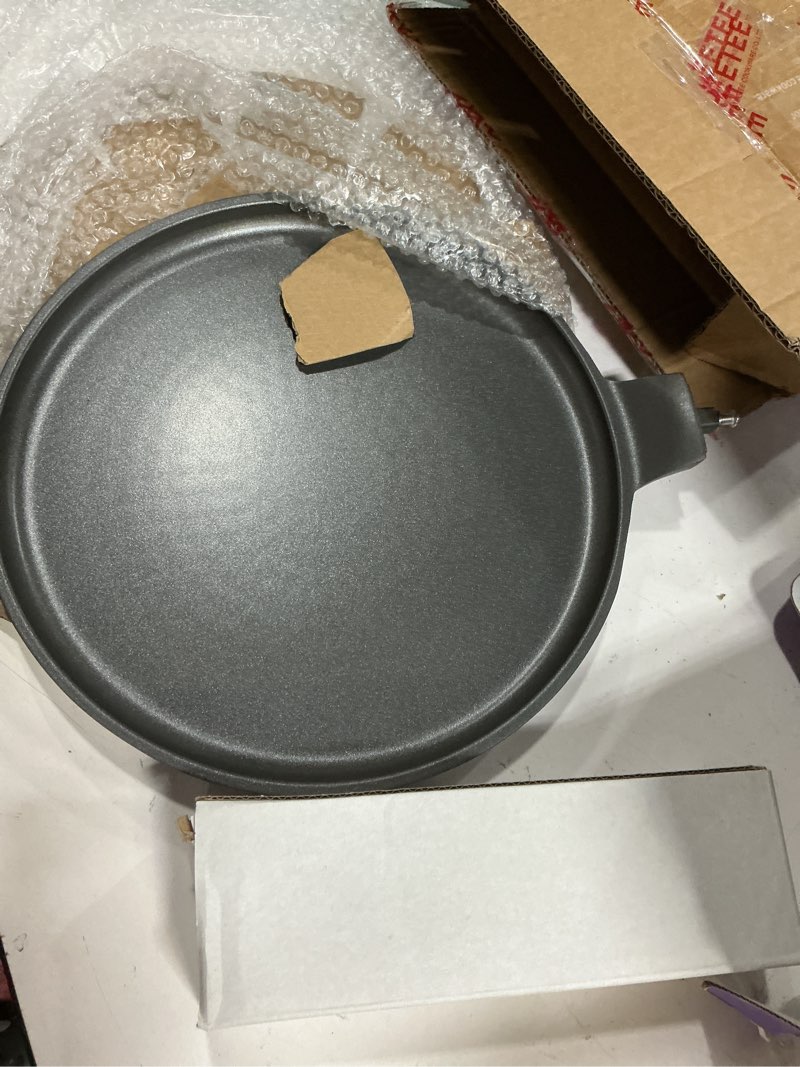 Condition photo showing New/Like New for JEETEE Nonstick Crepe Pan, 9.5 Inch Titanium Pancake Pan, Healthy Non-Toxic Flat Tawa Dosa Tortilla Pan for All Stovetops including Induction, PTFE & PFOA Free 9.5"