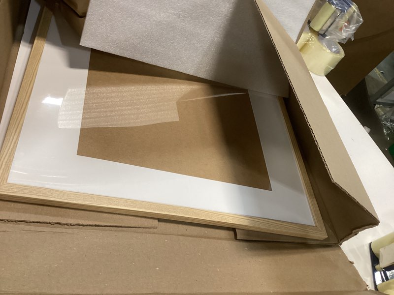 Condition photo showing New/Like New for upsimples 16x20 Picture Frame, Display Pictures 11x14 with Mat or 16 x 20 Without, Wall Hanging Poster Frame, Natural, 1 Pack Natural 16x20