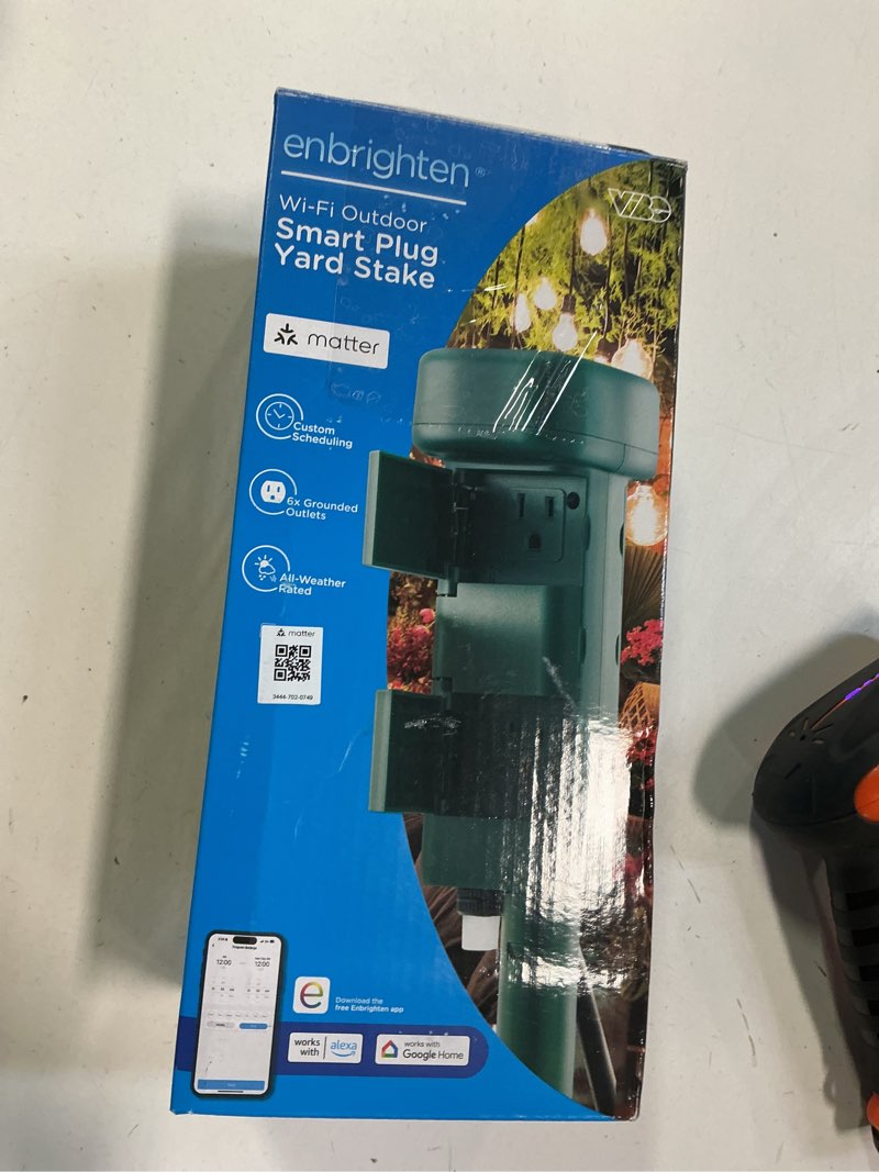 Condition photo showing As Is for Enbrighten Yard Stake 120-Volt 6 -Outlet Outdoor Smart Plug