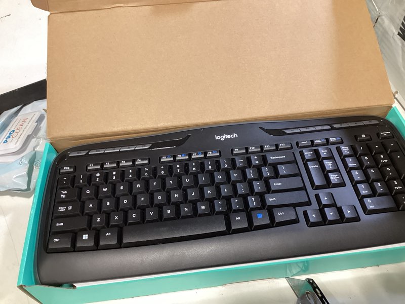 Condition photo showing New/Like New for logitech mk335 quiet wireless keyboard and mouse combo - black/silver keyboard and mouse combo wireless, ambidextrous