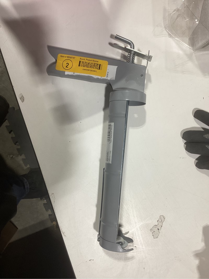 Condition photo showing As Is for Project Source 10 -oz Smooth rod Caulk Gun