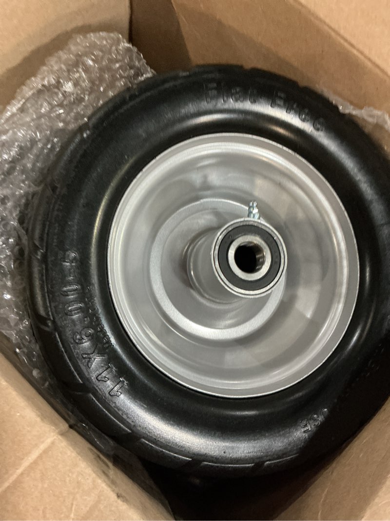 Condition photo showing New/Like New for 11x6.00-5 flat free tire with chevron tread gray rim -2pack | zero turn lawn mower tires with 3/4" or 5/8" and 1/2" bearings, 5.2"-8.3" centered hub,11x6.00-5 tires for zero turn mower 11x6.00-5 gray -2pack