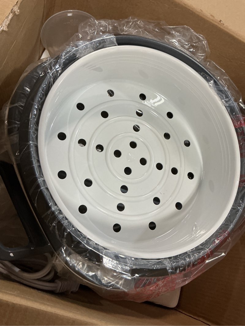 Condition photo showing Good Condition for black+decker rice cooker 14-cup (cooked) with steaming basket, removable non-stick bowl, white