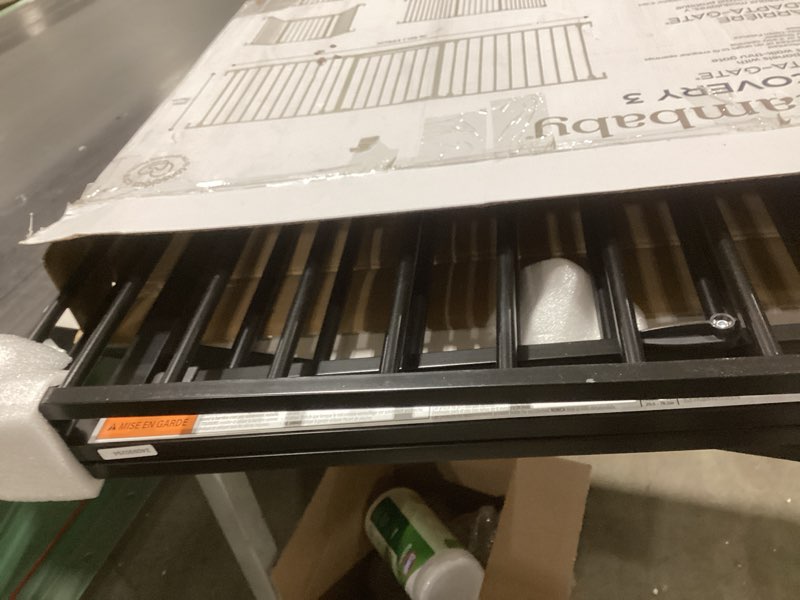 Condition photo showing Good Condition for Dreambaby Discovery Metal Baby Gate - 76.5" Extra Wide 3 Panel Walk Through Door for Angled Openings, Configurable for Stairs and Hallways, 29in High Discovery 3 Panel Black 29-76.5 Inches