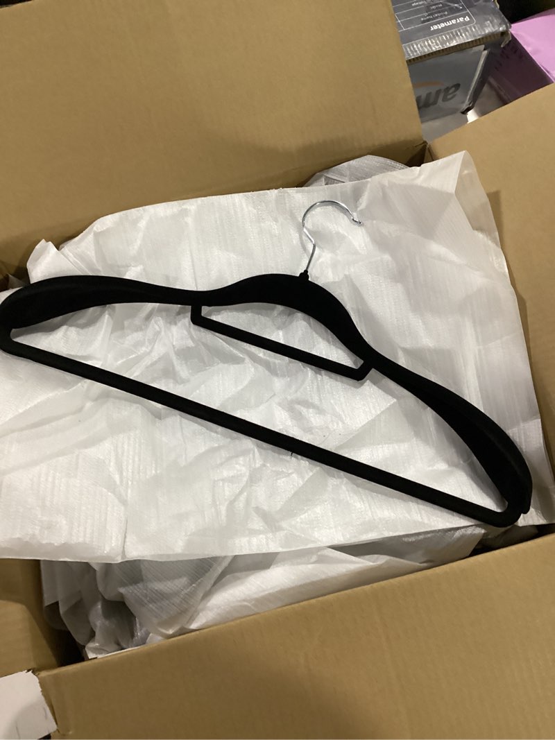 Condition photo showing New/Like New for 12 Pack Velvet Suit Hangers for Men, 360 Rotating Hooks, Non-Slip, Space-Saving, Suitable for Dress, Pants, Shirts, Skirts, Ties Black 12 Pack