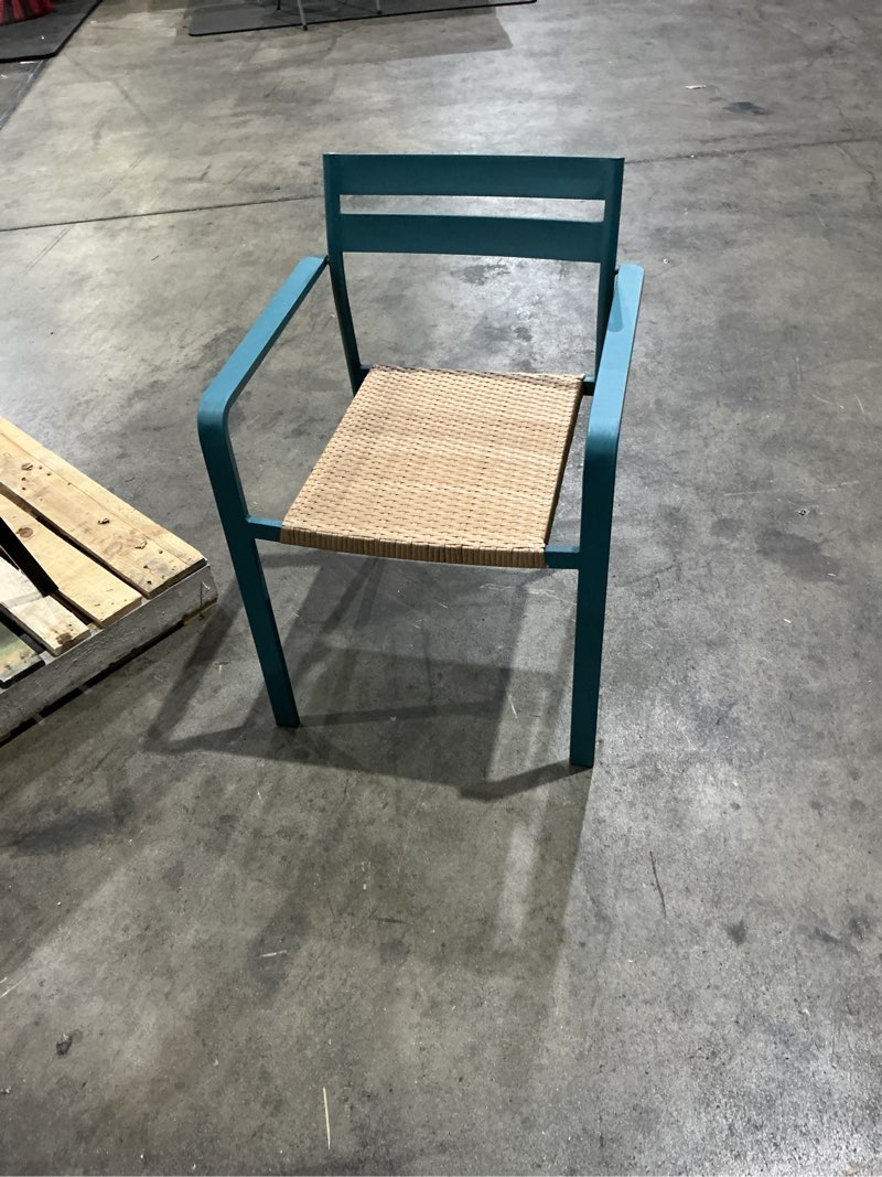 Condition photo showing As Is for  style selections darcy wicker stackable teal steel frame stationary dining chair with woven seat