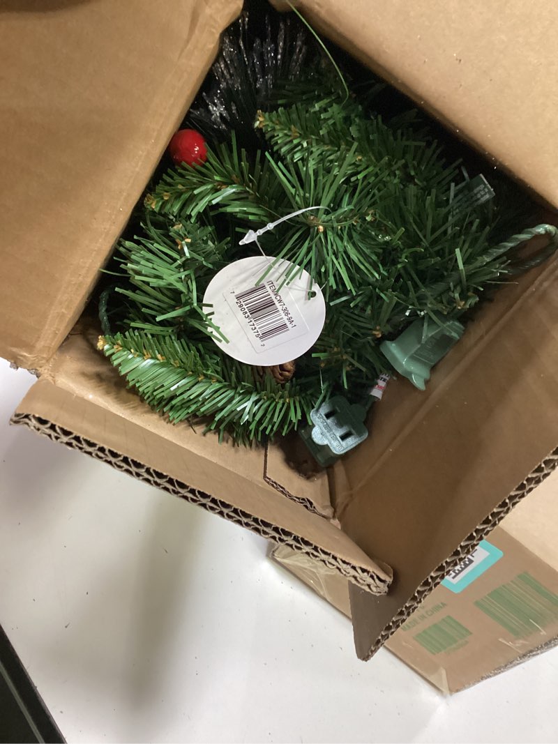 Condition photo showing Good Condition for national tree company 9 ft pre-lit crestwood spruce artificial christmas garland, christmas decoration with glitter, pinecones, red berries, 50 clear lights, 180 tips, green plug in tree