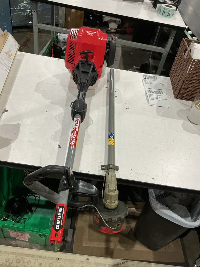 Condition photo showing As Is for craftsman cmxgtamd30sa 30cc 4-cycle gas powered straight shaft string trimmer, liberty red