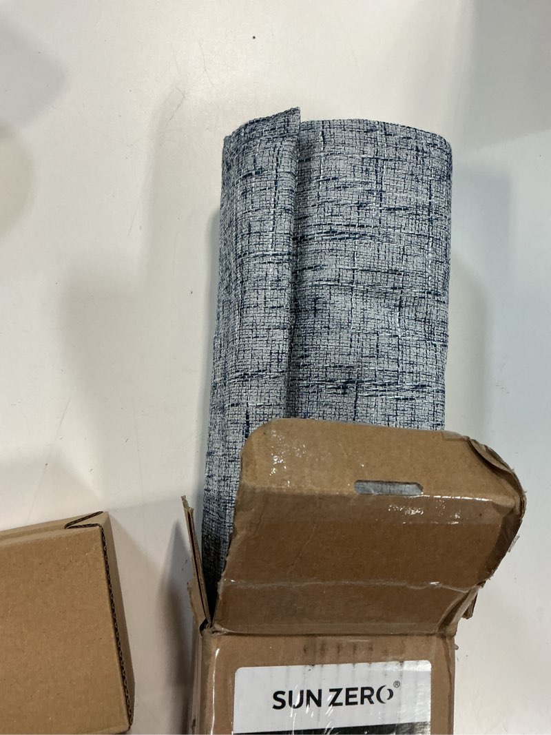 Condition photo showing Good Condition for sun zero seraphina textured 100% total blackout cordless roman shade, blue, 34" w x 64" h blue 34"w x 64"h