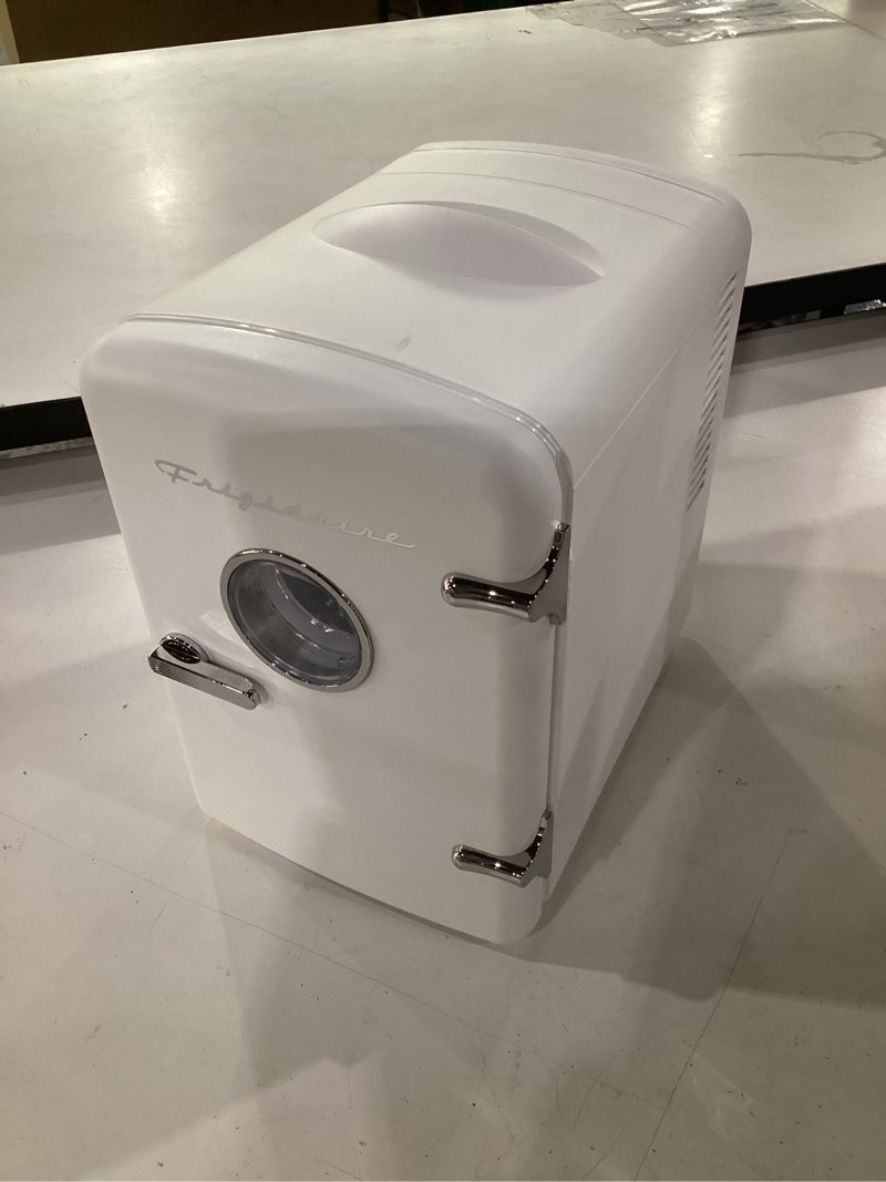 Condition photo showing Good Condition for frigidaire efmis171 retro mini portable personal fridge - ideal for home, office or dorm - includes carrying handle, ac/dc wall/car charger (white)