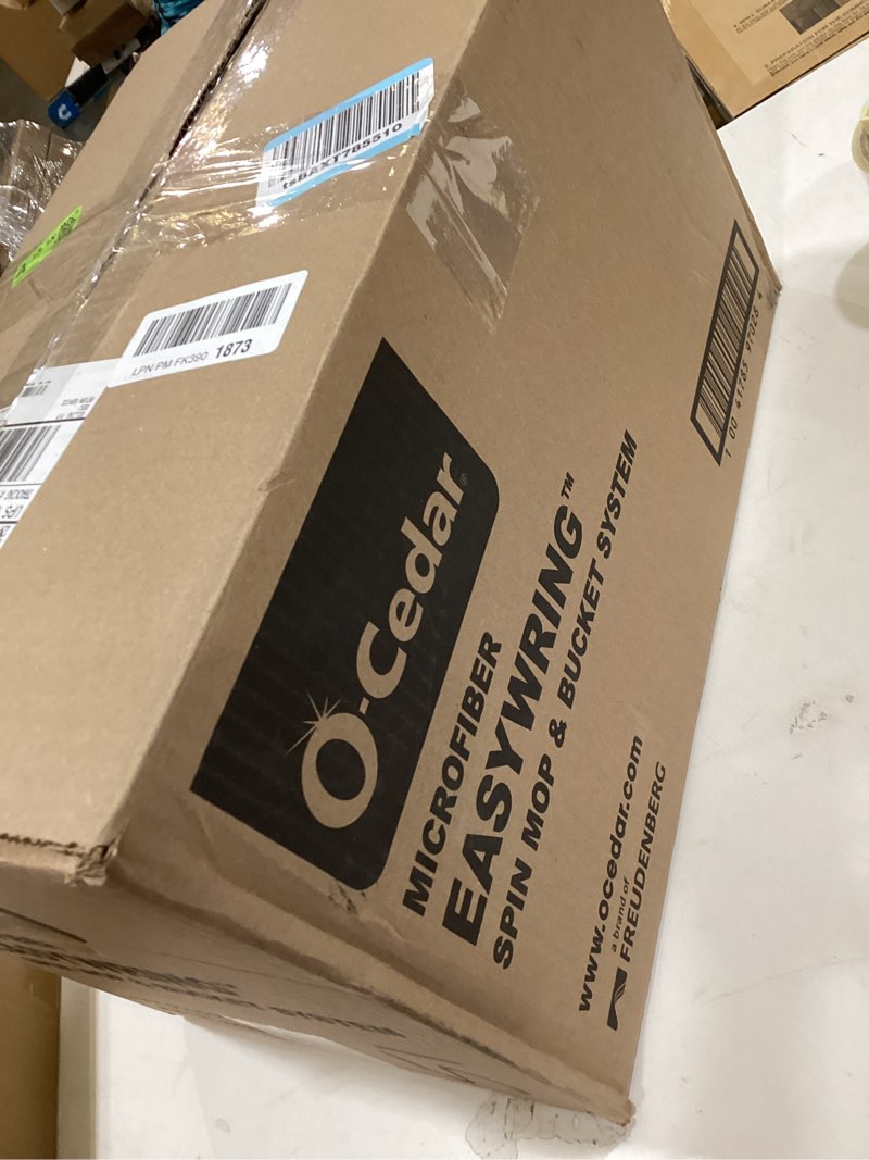 Condition photo showing New/Like New for Spin mop and bucket system