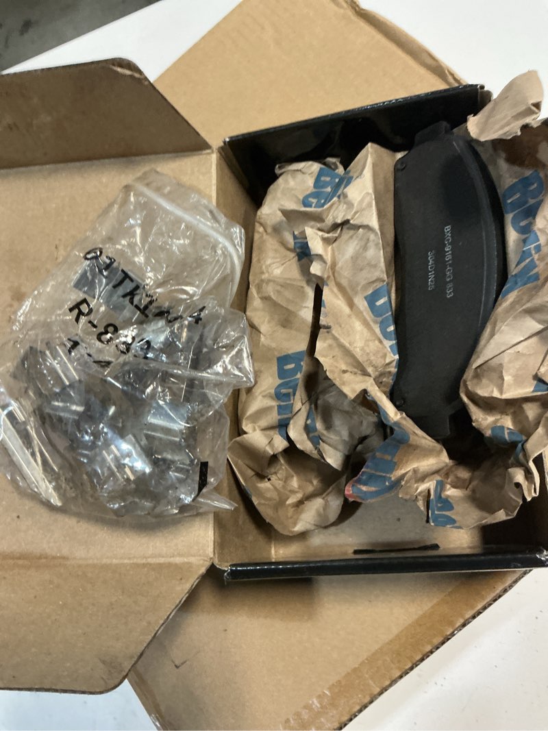Condition photo showing As Is for disc brake pad set
