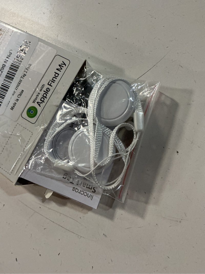 Condition photo showing Good Condition for air tracker tag 2 pack [apple mfi certified] with find my(ios only), key finder with no app needed, waterproof, 365-day standby,wallet key bag luggage tracker silver