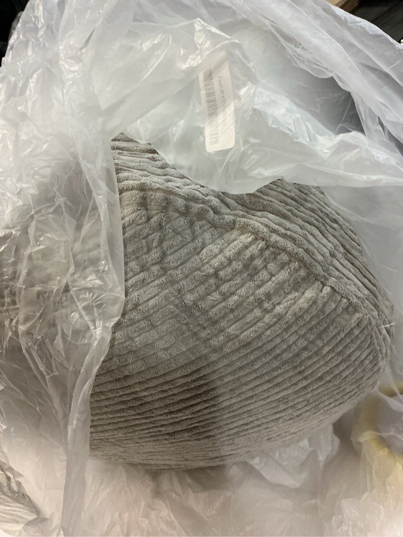 Condition photo showing As Is for Pouf Ottoman Stuffed Round Modern Foam Filled Foot Rest Poufs for Living Room Chair Decorative 20 X 15 Inches Fluffy Pouf Foot Stool Storage Ottoman, Grey Black 20 Inch