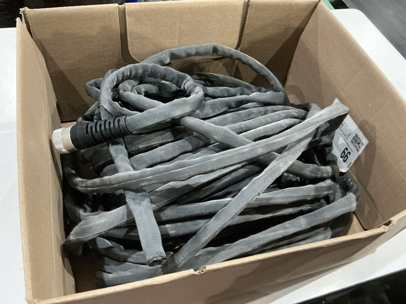 Condition photo showing As Is for zero-g teknor apex 5/8-in x 100-ft premium -duty kink free woven gray hose