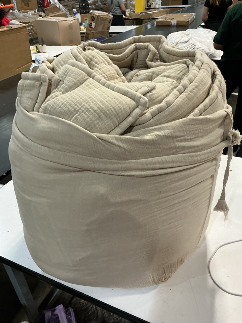 Condition photo showing As Is for organic cotton gauze dream quilt, king/cal king, dune