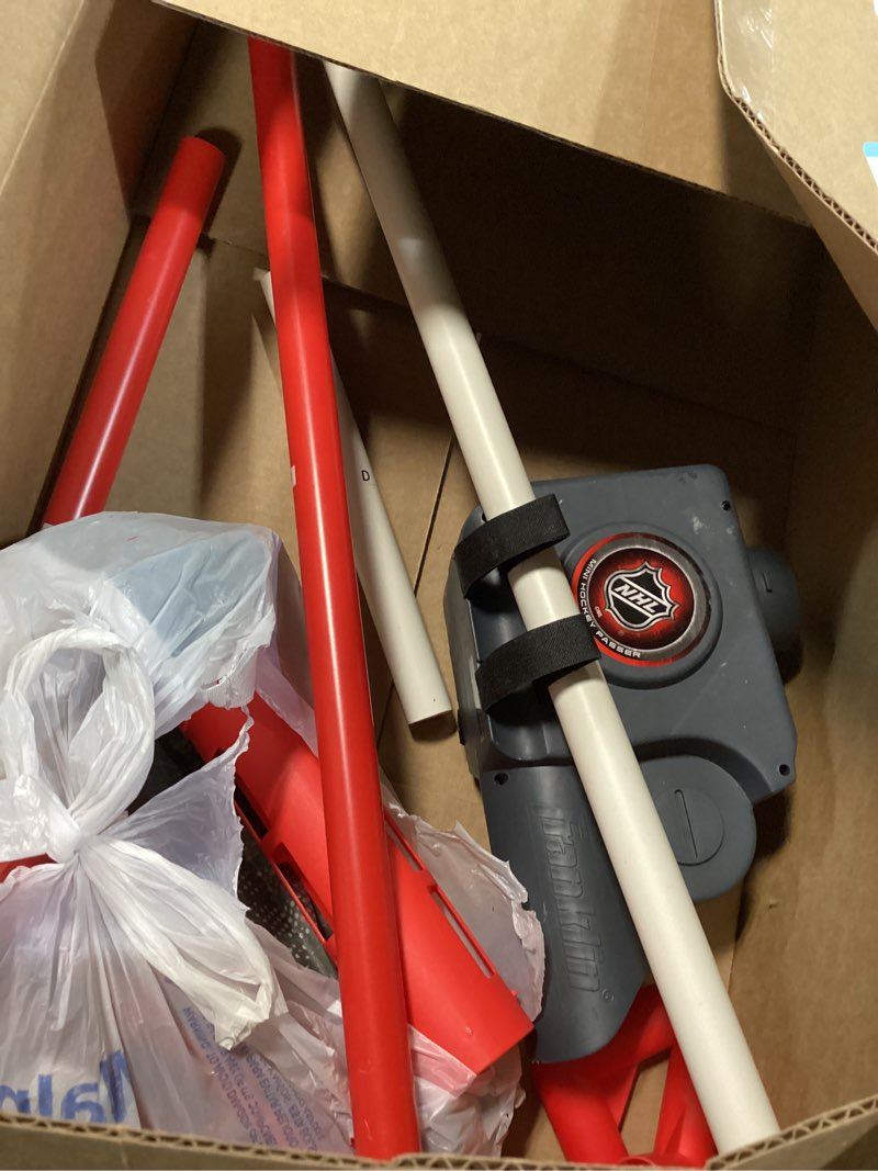 Condition photo showing As Is for Franklin Sports NHL Automatic Mini Hockey Ball Passer - Knee Hockey Ball Passer  - NHL Licensed One Size