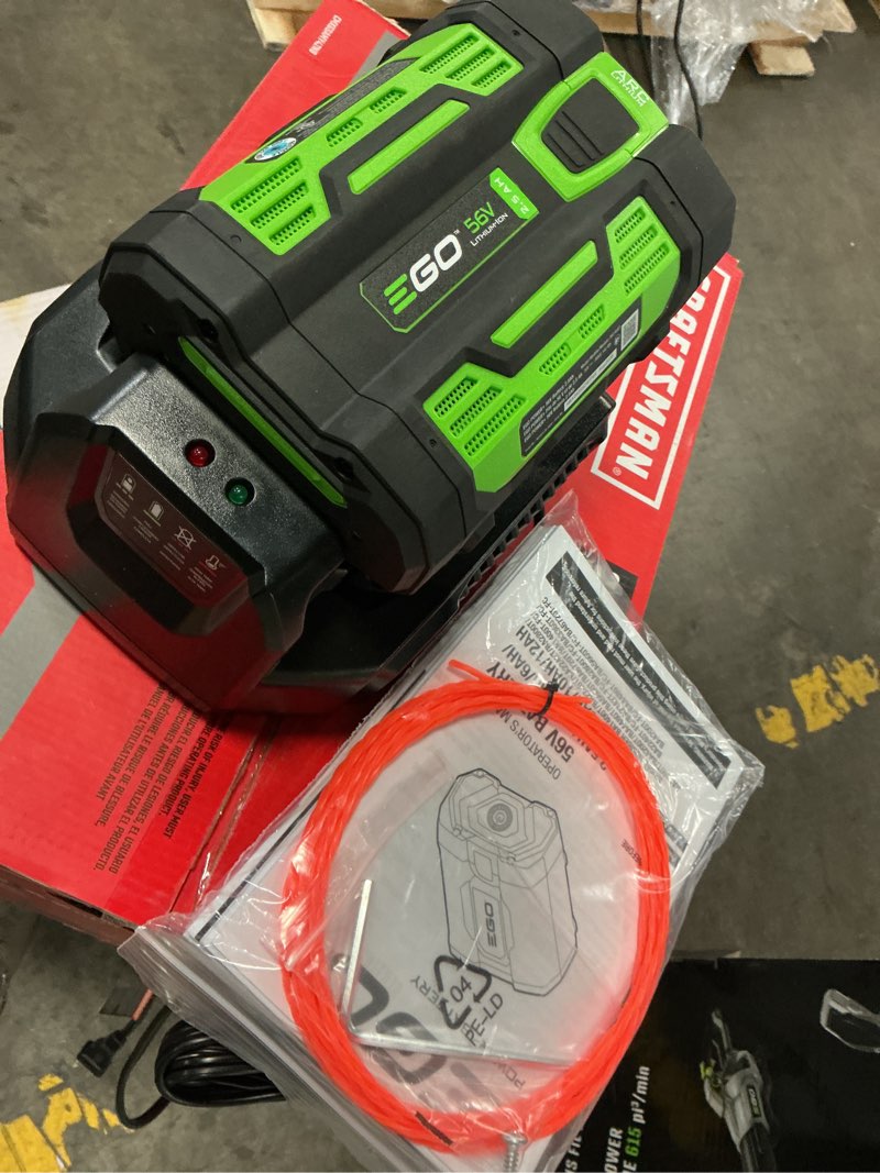 Condition photo showing As Is for ego power+ st1502sa 15 in. 56 v battery string trimmer kit (battery & charger) split shaft w/ rapid reload & 2.5 ah battery
