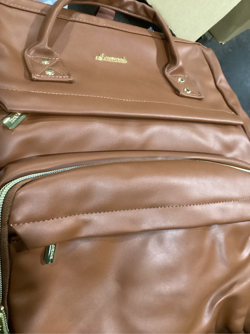 Condition photo showing Good Condition for LOVEVOOK Laptop Backpack for Women, 15.6 Inch Work Business Backpacks Purse With Large Capacity, Waterproof Nurse Bag College Bookbag for School, Waterproof Casual Daypack for Travel 15.6 INCH Brown