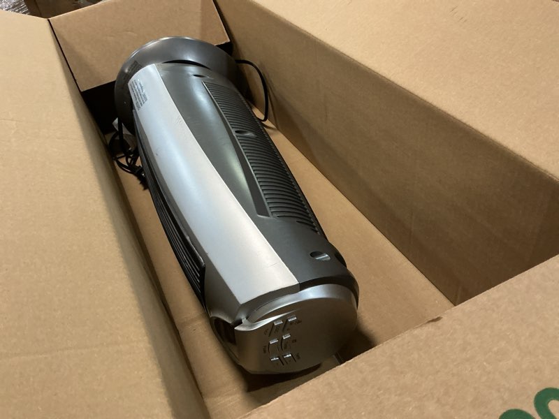 Condition photo showing As Is for comfort zone portable 1500w ceramic oscillating digital tower space heater