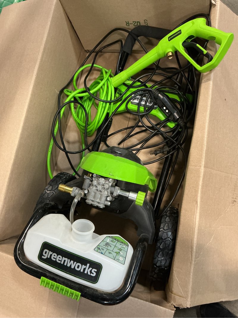 Condition photo showing As Is for greenworks 2200-psi 1.2-gpm cold water electric pressure washer with 4 spray tips