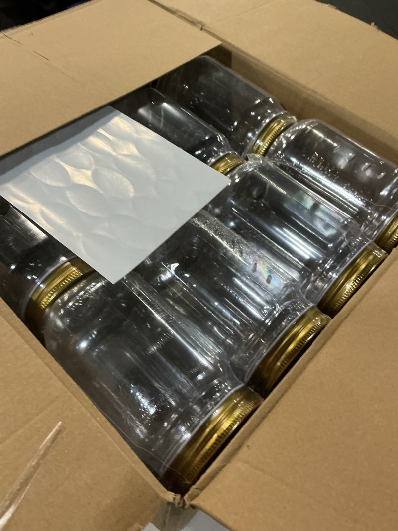 Condition photo showing Good Condition for novelinks 16 oz clear plastic jars with lids, refillable 16oz mason jars with lids & storage containers for kitchen & household use (24 pack,gold) 24 pack 16 ounce gold