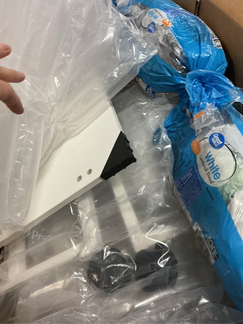 Condition photo showing As Is for GreenForest Folding Desk with Wheels and Storage Shelf, 24.8 Inch Compact Portable Rolling Desk for Small Spaces, Mobile Foldable Computer Table, Easy Assembly, Pure White 24.8 inch Pure White