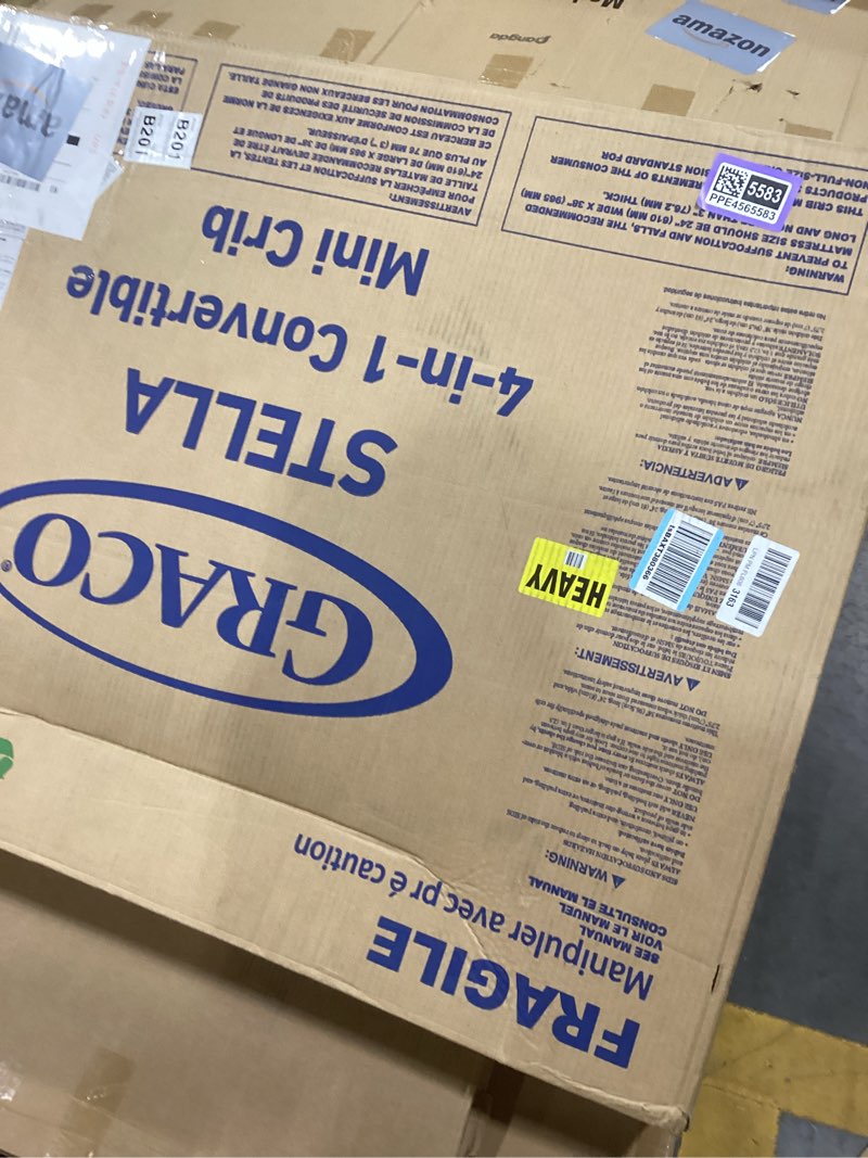 Condition photo showing As Is for Graco Stella 4-in-1 Convertible Mini Crib with Bonus Mattress (White) – Includes Bonus 2.75 Inch Thick Mattress with Water-Resistant Cover, Converts to Twin Bed, Ideal Crib for Small Spaces White Mini Crib