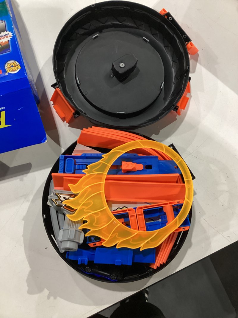 Condition photo showing Good Condition for toy car race track set for kids ages 4-8, stunt tire-shaped case transforms into race course, 6 cars in 1:64 scale, 2 ways to play, action loop cyclone challenge & speed snap track