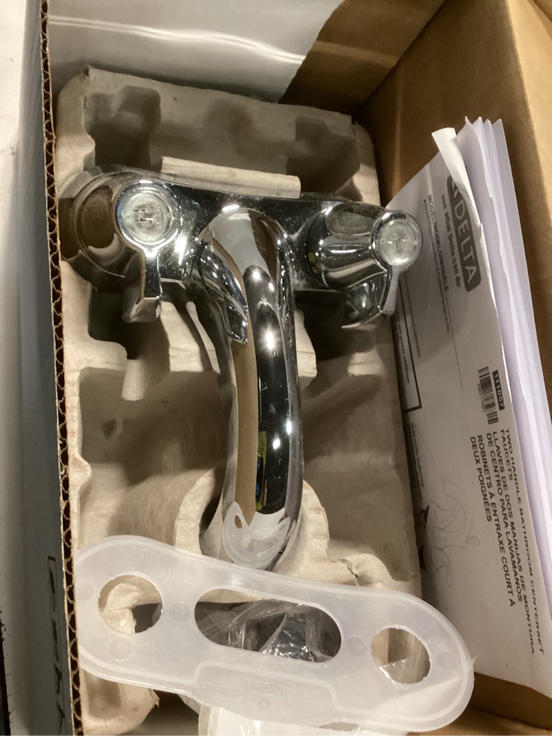 Condition photo showing As Is for DELTA FAUCET 2500LF, 2.87 x 6.00 x 3.43 inches, Chrome