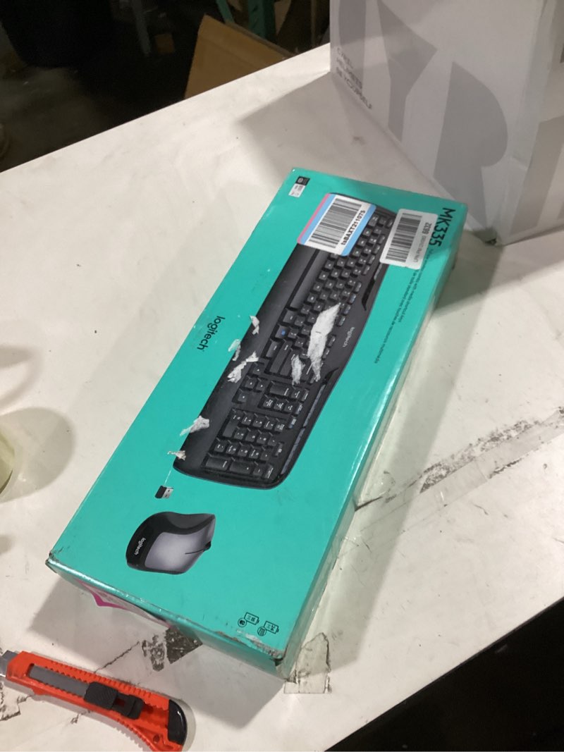 Condition photo showing New/Like New for logitech mk335 quiet wireless keyboard and mouse combo - black/silver keyboard and mouse combo wireless, ambidextrous