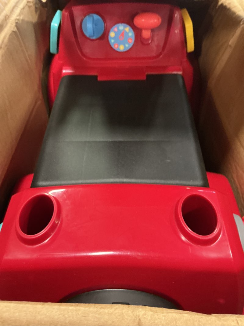 Condition photo showing Good Condition for Radio Flyer Busy Buggy Ride On Toy Car with 17 Interactive Activities, Sit-to-Stand for Ages 1-3, Features Built-in Storage, Walk or Ride Options for Toddler Development and Play Lights & Sound