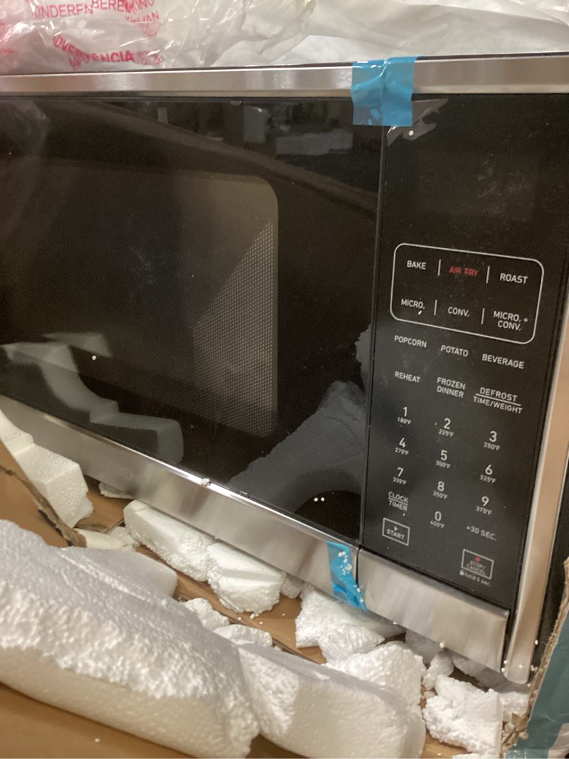Condition photo showing Good Condition for West Bend 3-in-1 Microwave Air Fryer Convection Oven 1000-Watts with 10 Power Levels and 12 Presets, Speed Defrost, Electronic Control Panel and Glass Turntable, 1.3 Cubic Feet, Stainless Steel