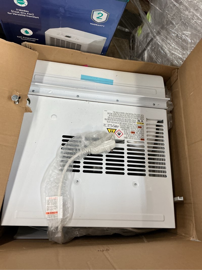 Condition photo showing As Is for ge large room window air conditioner , remote included ( 115-volt , 14000-btu )
